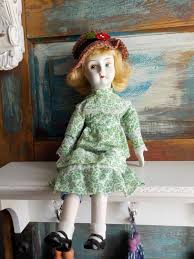 The 2 holes shows where the head area was attached to the rest of the body. Walda Doll 70 S Porcelain Doll China Head Doll Vintage Porcelain Girl Doll With Hat And Green Prairie Dress Collectible Doll Vintage Porcelain Porcelain Dolls Value Collectible Dolls