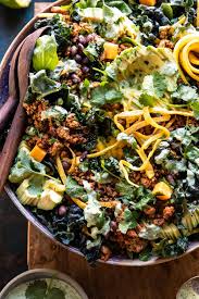 Black Bean Taco Salad With Lime Vinaigrette Spicy Turkey Taco Salad With Baja Dressing Half Baked Harvest Recipe Turkey Taco Salad Mexican Salads Turkey Tacos