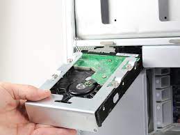 Gently remove the hard drive of the case (you may need to remove 4 screws from sides of hdd, or unlock sliding brackets (green plastic or metal box) and slide out the drive of the metal frame. Mac Pro First Generation Hard Disk Drive Hdd Replacement Ifixit Repair Guide