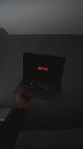 Hd Wallpaper Person Holding Black Laptop Computer Netflix Logo Keyboard Wallpaper Flare Find & download free graphic resources for netflix logo.