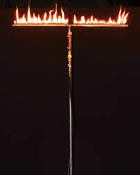 The yoke bracket is made of solid wrought iron and available in many sizes. 4 The Flambeau Make Fire Book