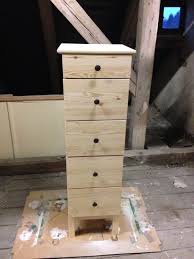 Next, we used screws to attach the two dressers together from the inside. Ikea Hack Tarva Oriental Vibes With Stain And Stencils Craftify My Love