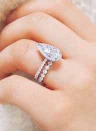 Eternal Love This Stunning Platinum Pear Shaped Engagement Ring And Eternity Custom Wedding Ring Bands Set Engagement Ring Shapes Pear Shaped Engagement Rings