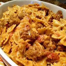 Italian Sausage And Pasta With Tomato Cream Sauce Recipe Main Dishes With Bow Tie Pasta Saus Creamy Pasta Dishes Italian Sausage Pasta Italian Sausage Recipes