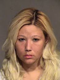 Phoenix woman who shot husband, then lit cigarette, sentenced to 20 years