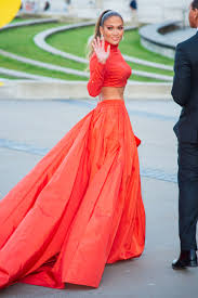 Jennifer lopez, 48, flaunts her incredible legs in red mini dress. Jennifer Lopez S Best Fashion Moments J Lo S Best Outfits
