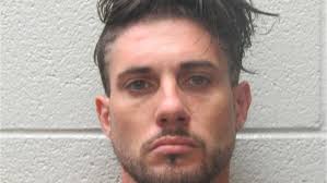 2 arrested, charged in Horse Shoe armed robbery