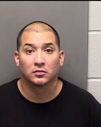 Father charged after toddler unknowingly brings gun to preschool