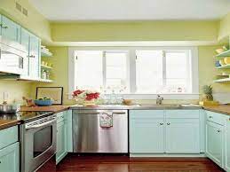 Paint different colors above and below. Kitchen Cabinet Color Ideas For Small Kitchens Kitchen Color Ideas For Small Kitchens Benjami Kitchen Design Small Small Kitchen Colors Small Apartment Kitchen