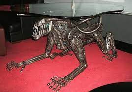 The sleek design of the glass with the decks makes it perfect for a living room. Alien Coffee Table Weird Furniture Cool Coffee Tables Artistic Furniture