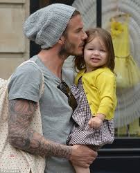 David Beckham Showers Grinning Harper With Kisses As He And Victoria Are Reunited In Paris David Beckham Family David And Victoria Beckham Harper Beckham