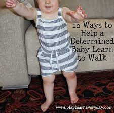 Don't help your baby walk. Play And Learn Everyday 10 Ways To Help A Determined Baby Learn To Walk Teaching Baby To Walk Baby Learning Helping Baby Walk