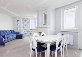 Maybe you would like to learn more about one of these? Dining Area In White Modern Apartment With Dining Table And Chairs Stock Photo Picture And Royalty Free Image Image 144643956