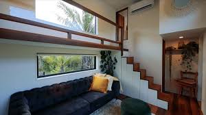Built in sofa house goals nautical industrial windows bedroom kids rooms storage building. This Woman Designed And Built Her Own Tiny House For Herself And Her Daughter