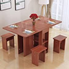 A table suspended from the ceiling. Folding Dining Room Table Wild Country Fine Arts