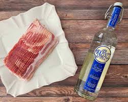 Technically, this technique is bacon washing rather than infusing. Bacon Vodka Recipe With Printable Labels Bensa Bacon Lovers Society