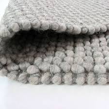 Our wool rugs are sourced from real, happy sheep. Grey Pebble Rug Novocom Top
