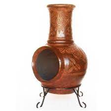 Convert between fire and tabletop as needed. 37 In Clay Kd Chiminea With Iron Stand Scroll Kd Scroll The Home Depot