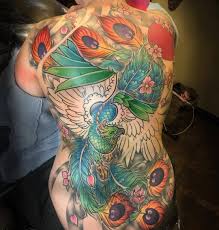 Ink these bird tattoo to engrave your sky touching dreams in your soul. Phoenix Bird Tattoo Design Novocom Top
