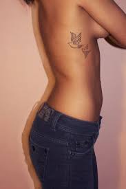 Bird Tattoo On Ribs Men 50 Cute And Lovely Dove Tattoos For Men And Women In 2020 Dove Tattoos Tattoos For Guys Arm Tattoos For Guys