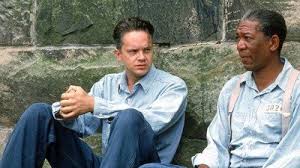 Two life sentences for a 1947 double murder land an innocent man (tim robbins) in a corrupt maine penitentiary. The Shawshank Redemption Movie Review 1994 Roger Ebert
