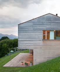 Dietrich Untertrifaller Recesses Garage Into Wooden Hill Edge Residence In Austria Architecture Arch House Architecture House