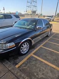 Image result for Light Ice Blue 2010 Town Car