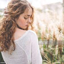 Rear View Of Woman Standing On Field Looking Down Long Hair Girl Curly Hair Styles Naturally Woman Standing