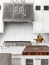 Skip a full kitchen remodel with new countertops that make a big impact. White Modern Marble Chevron Backsplash Tile Backsplash Com