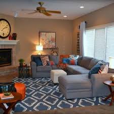Pin By Emily Kerns On Basement Blue And Orange Living Room Living Room Orange Blue Family Rooms