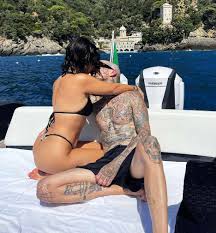 Kourtney Kardashian Kisses Travis Barker in Snaps from Italy Trip
