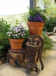 Pots On Logs To Vary Height Good Idea Country Gardening Container Gardening Garden Containers