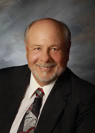 Should a coach cut a player or let them ride the bench in a travel baseball  team?