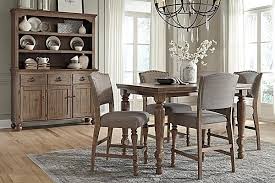 The Tanshire Counter Height Dining Room Table From Ashley Furniture Homesto Counter Height Dining Room Tables Dining Room Table Set Counter Height Dining Table