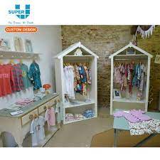 High Quality Oem Odm Wooden Retail Kids Clothing Wall Display Shelf View Odm Oem Wooden Clothing Display Shelf Super U Product Details From Guangzhou Super U In 2021 Childrens Shop