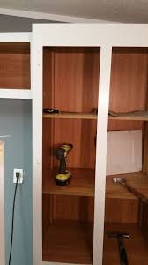 Drawing level lines on the wall to represent the base. How To Take Cabinets Off The Wall In A Mobile Home Hometalk