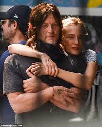 Diane was brought up roman catholic into a family and attended catholic school. Diane Kruger And Norman Reedus Steal A Kiss In A Park In New York Oltnews