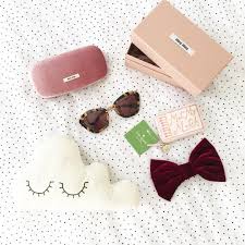 Une Partie De Mes Cadeaux Est Arrivee Enfin Des Lunettes Miumiu Un Joli Porte Monnaie Katespadeny Et Un Joli Coussin Sunglasses Case Fashion Blog My Style