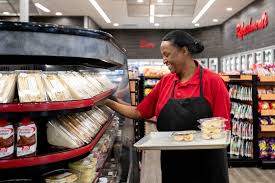 The design seeks to honor the buildings blue collar history with fully functioning garage doors and custom gas pump light fixtures. East Memphis Shell Gas Station The One Known For Its Food