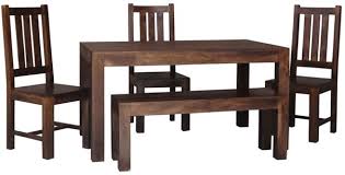 The dining chairs feature a sturdy design with soft fabric cushioned seats, providing both comfort and style for your dining pleasure. Jaipur Dakota Walnut Mango Wood Small Dining Table With 4 Dakota Chairs And Small Bench Cfs Furniture Uk