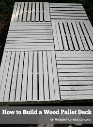 How To Build A Wood Pallet Deck Pallet Decking Pallet Patio Decks Diy Deck