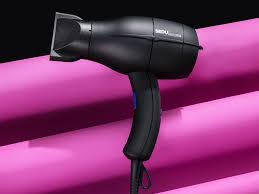 The stylists suggest you put hair oil on wet hair before blow drying. How To Use A Blow Dryer Without Looking Like Ace Ventura Gq