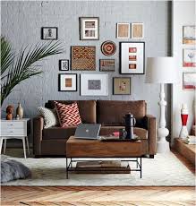 I just moved and bought a dark gray leather rap around couch and my walls are all white. Decorating Around A Leather Sofa Centsational Style Brown Sofa Living Room Brown Couch Living Room Couches Living Room