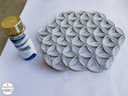After the blue paint was dry, i used a small paint brush to randomly paint a few of the petal insides a green color. Wall Art How To Make Flower Of Life Out Of Toilet Paper Rolls Creativity Hero