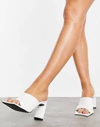 In our onlineshop you can find flat mules, heeled mules and platform mules. Public Desire Vice Mules Mit Absatz Und Statement Zehenpartie In Weiss Asos