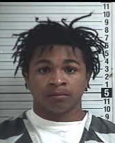 Four arrested, one still