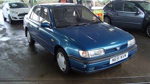 Cans of green and yellow fluorescent fuel dye. File 1994 Nissan Sunny 1 6 Slx 12881850845 Jpg Wikimedia Commons
