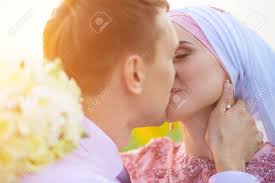 Holding hands for a married couple is tolerated but kissing and petting are considered an offence to public decency, it adds. Muslim Couple Kiss Pic
