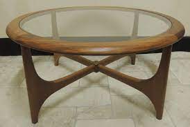 Make the most of any space with storage tables that include drawers or shelf space. Antiques Atlas Retro Nathan Glass Top Coffee Table