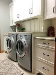 The current design trend is to make your home's style feel as seamless as possible from room to room, so by redesigning your kitchen and laundry at the same time, you're able to use the same cabinet door profile in each space, as well as other materials such as matching benchtops and shelving. Laundry Cabinets Evansville In